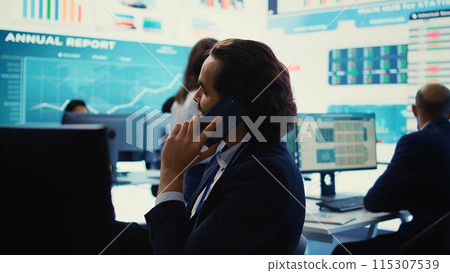 Chief financial officer sharing firm progress on a phone call with the main investor, ensuring performance based on current situation. Administrator works to expand enterprise budget. Camera B. 115307539