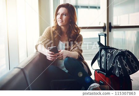 Woman, airport or luggage with phone for thinking, waiting with smile for travel or vacation. Female person, happiness or idea for holiday destination with mobile, contemplating or planning in London Woman, airport or luggage with phone for thinking, waiting with smile for travel or vacation. Female person, happiness or idea for holiday destination with mobile, contemplating or planning in London 115307863