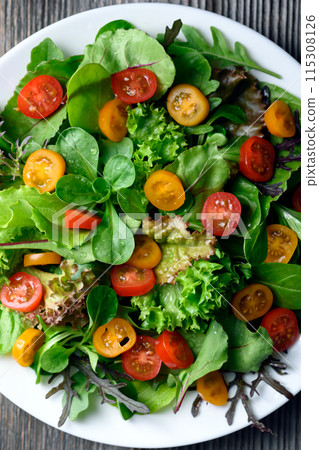 Mix of fresh organic juicy salad greens 115308126