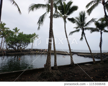 People use Ahalanui spring fed pool 115308648