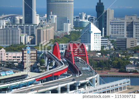 Kobe cityscape: Port Liner crossing Kobe Bridge Kobe cityscape: Port Liner crossing Kobe Bridge 115309732