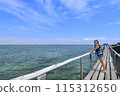 Japanese girl enjoying island hopping (Nalusuan Island, Cebu, Philippines) 115312650