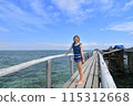Japanese girl enjoying island hopping (Nalusuan Island, Cebu, Philippines) 115312668