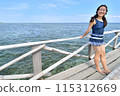 Japanese girl enjoying island hopping (Nalusuan Island, Cebu, Philippines) 115312669