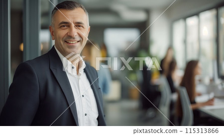 Confident Mature Businessman in Modern Office - Professional Portrait for Corporate, Marketing, and Promotional Materials 115313866
