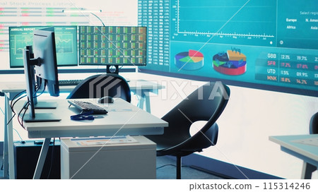 Empty business enterprise control room with a big LED screen used in monitoring organizational statistics and progress. Global firm headquarters used for briefing meetings. Camera A. Empty business enterprise control room with a big LED screen used in monitoring organizational statistics and progress. Global firm headquarters used for briefing meetings. Camera A. 115314246