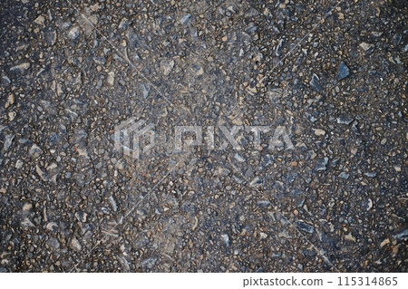 Concrete road have a rough surface. Gravel craggy texture and background 115314865