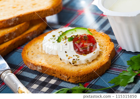 Sandwich with green cheese 115315850