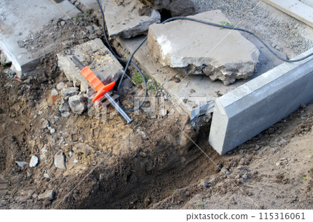 Slab paving process with chisel and angle grinder. Earth dig for slab and chisel, paving process. tool manufacturers, construction equipment suppliers, and DIY project guides Slab paving process with chisel and angle grinder. Earth dig for slab and chisel, paving process. tool manufacturers, construction equipment suppliers, and DIY project guides 115316061