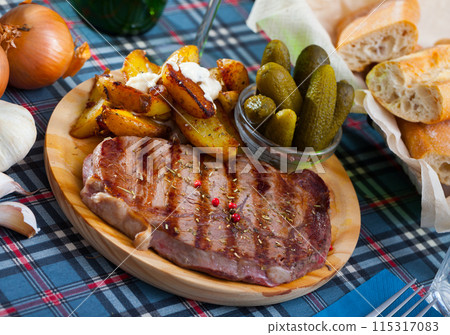 Roasted veal steak 115317083