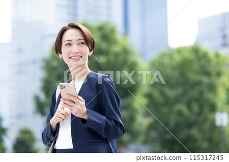 Portrait of a woman with a business smartphone 115317245