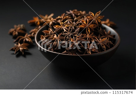Anise on a black background. 115317674