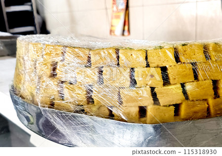 Famous Indian sweet Patisa decorated in a sweet shop Famous Indian sweet Patisa decorated in a sweet shop 115318930