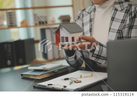 buy or sell real estate mortgage, Sale representative offer house purchase contract to buy a house or apartment and mortgage Money and Financial Concepts 115319114