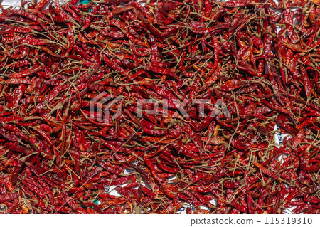 Close up dried chilli background. Red hot chili wallpaper Close up dried chilli background. Red hot chili wallpaper 115319310