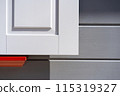 White shutters on a gray facade with red. High quality photo. Abstract minimalistic background 115319327