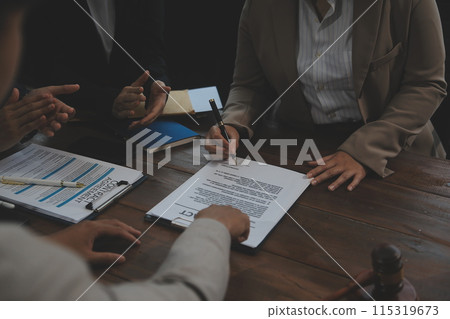 Judge gavel with Justice lawyers having team meeting at law firm background. Concepts of Law and Legal services. Judge gavel with Justice lawyers having team meeting at law firm background. Concepts of Law and Legal services. 115319673