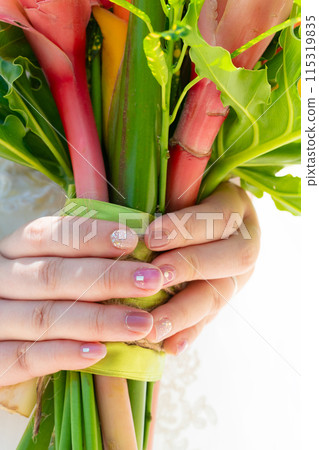 新娘手捧花的特寫 新娘手捧花的特寫 115319835