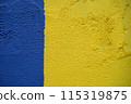 The wall is painted blue and yellow. High quality photo 115319875