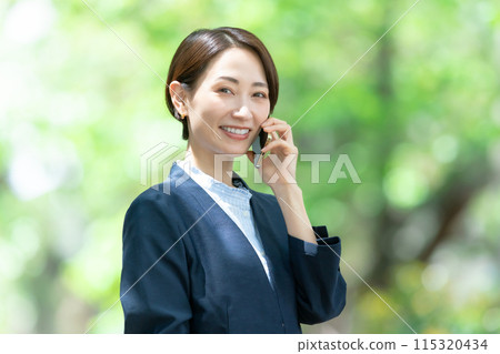 Middle female smartphone call Middle female smartphone call 115320434