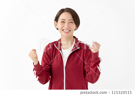 穿著球衣的女人拳頭泵 115320515