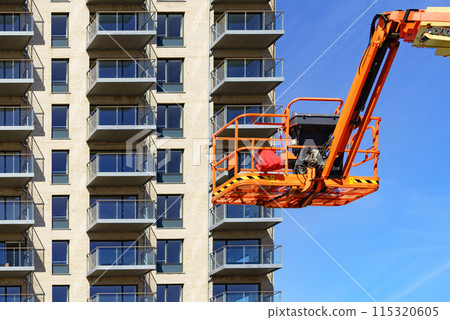 Basket lift on construction site 115320605