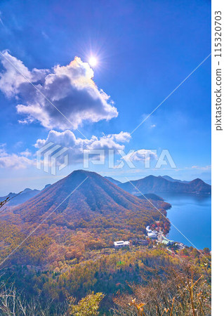 View of the south side (Haruna Fuji, Mt. Tenmoku, Lake Haruna, etc.) from the summit of Mt. Haruna (Eboshigatake) in Gunma Prefecture in autumn View of the south side (Haruna Fuji, Mt. Tenmoku, Lake Haruna, etc.) from the summit of Mt. Haruna (Eboshigatake) in Gunma Prefecture in autumn 115320703