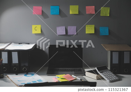 Studio workspace with laptop computer and office supplies. Work from home. With copy space Studio workspace with laptop computer and office supplies. Work from home. With copy space 115321367