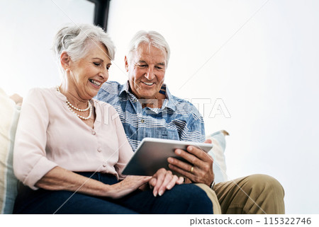Browsing, tablet and old couple in living room in house with funny online movie streaming on website. Subscription, laughing and people in home with entertainment, social media and app in retirement. Browsing, tablet and old couple in living room in house with funny online movie streaming on website. Subscription, laughing and people in home with entertainment, social media and app in retirement. 115322746