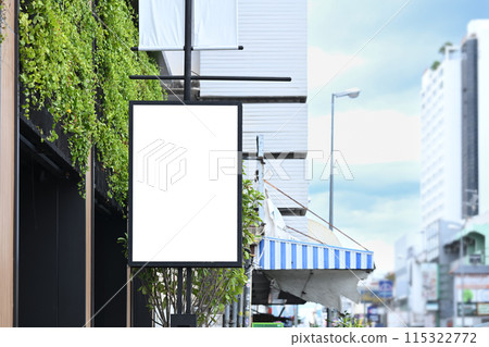 Blank vertical street poster billboard or signboard mockup on the city street for advertising 115322772