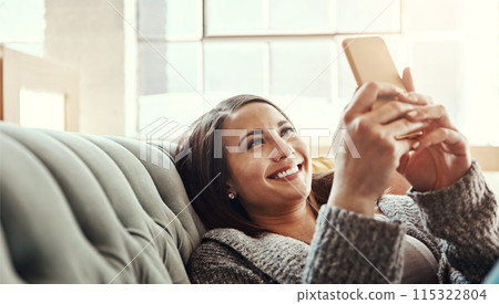 Phone, search and happy woman relax on a sofa with social media, streaming or reading subscription sign up info at home. Smartphone, app and person in a living room with online dating, chat or scroll Phone, search and happy woman relax on a sofa with social media, streaming or reading subscription sign up info at home. Smartphone, app and person in a living room with online dating, chat or scroll 115322804
