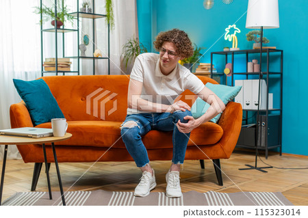 Caucasian man suffer from painful discomfort severe knee joint ache leg muscles knees illness cramps Caucasian man suffer from painful discomfort severe knee joint ache leg muscles knees illness cramps 115323014