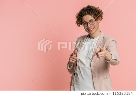 Smiling happy man pointing forward to camera, choosing lucky victory winner, indicating, promotion 115323194