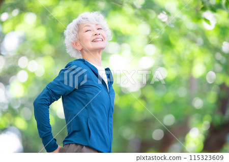 Woman in sportswear stretching 115323609