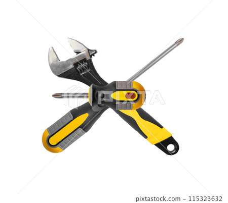 Isolated metallic tools including pliers and wrenches. Essential for repair and construction work. Isolated metallic tools including pliers and wrenches. Essential for repair and construction work. 115323632