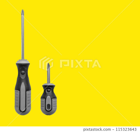 Metallic tools for precision repair work. Includes screwdrivers, wrenches, and cutters. Industrial 115323643