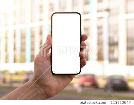 Mobile phone held in a hand. Perfect for digital and technology themes. Clean and modern design, on 115323644