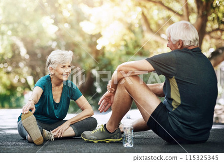 Senior man, woman and stretching exercise on road for fitness, discussion for retirement with smile. Mature couple, workout and together for happiness on street, outdoor with chat in neighborhood 115325345