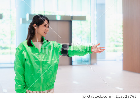 Event staff providing guidance with a smile Event staff providing guidance with a smile 115325765