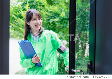 Event staff providing guidance with a smile Event staff providing guidance with a smile 115325772