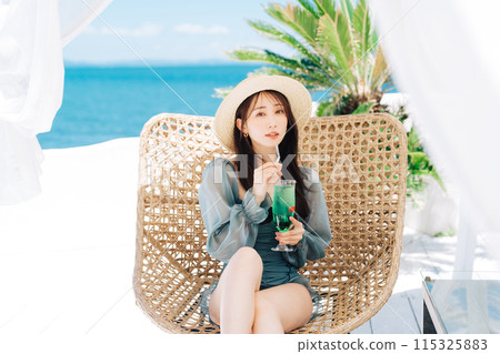 Young woman enjoying vacation at resort Young woman enjoying vacation at resort 115325883