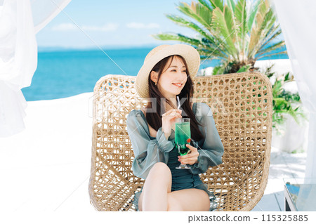 Young woman enjoying vacation at resort 115325885