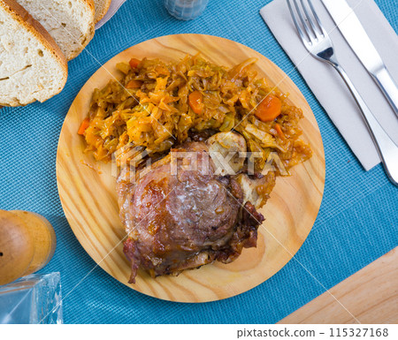 Spanish dish galtas al horno 115327168