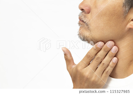 Man touching his beard, sideways, white background 115327985
