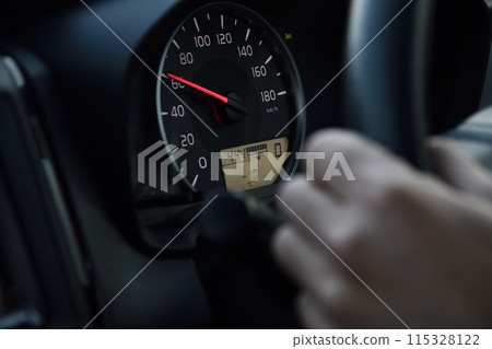 Car speedometer on a cold day Car speedometer on a cold day 115328122