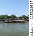 boat floating on river 115328647