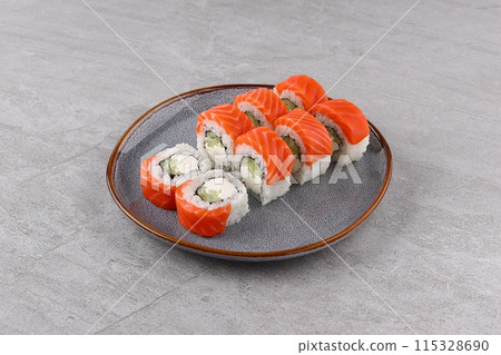 Sushi roll (Philadelphia) with salmon, cream cheese, Sushi menu. Japanese food. 115328690