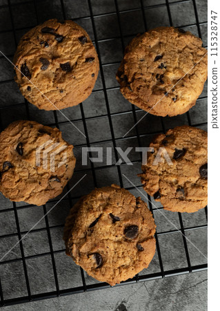 Freshly baked chocolate chip cookies. Freshly baked chocolate chip cookies. 115328747