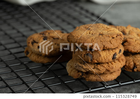 Freshly baked chocolate chip cookies. Freshly baked chocolate chip cookies. 115328749