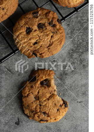 Freshly baked chocolate chip cookies. 115328766